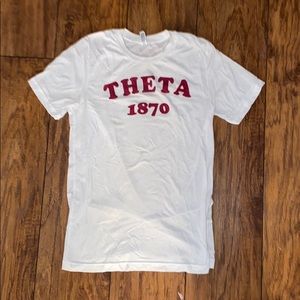 Theta 1870 white t shirt with red writing